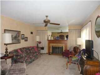 Living room, fireplace works. Hardwood underneath 