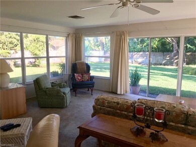 Windows on both sides of the home flood the living
