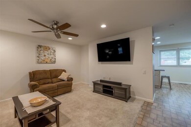 Open living space between the great room and break
