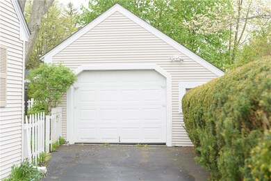 OVER SIZED GARAGE WITH AUTOMATIC DOOR OPENER AND A