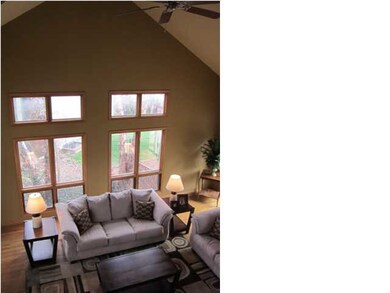 Great room, two story vaulted ceiling,