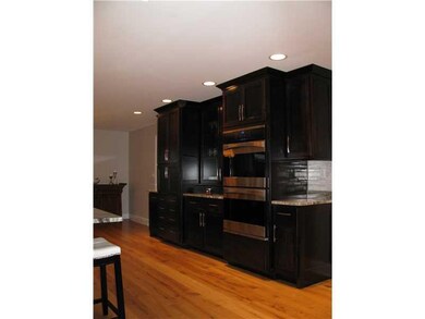 Kitchen. GLASS FRONTS TO PRESENT FINE PIECES, DOUB