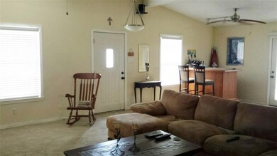 This view is standing from behind the second couch
