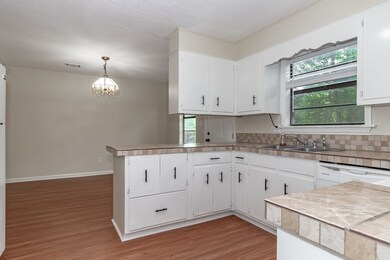 Kitchen is open to breakfast room and dining room
