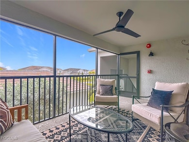 Sunroom featuring a residential view
