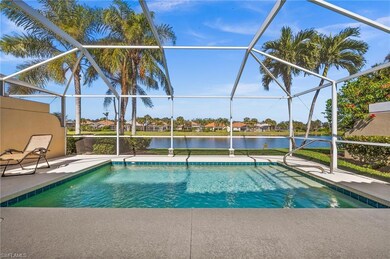 Outdoor pool featuring a patio, a water view, and 