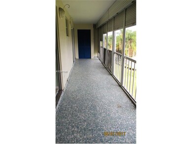 Freshly painted screened in patio with roll down s