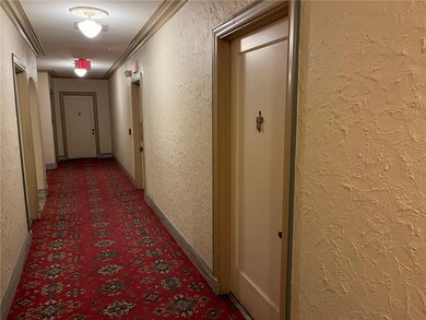 2nd door from steps, near elevator.