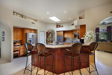 Circular Kitchen Opens to Three Rooms