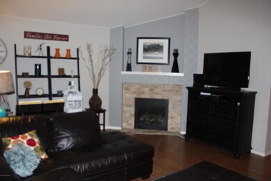 Living Room w/Laminate Flooring & FP