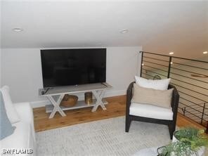 Sitting room featuring hardwood / wood-style floor