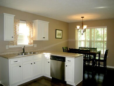 Dining area has a lovely view of large, private yard.  