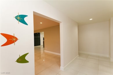 Front Entry. Living room, kitchen & den to the lef