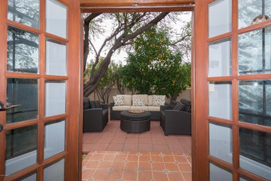 Double French doors to side patio
