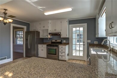 Kitchen with granite counter tops, stainless appli