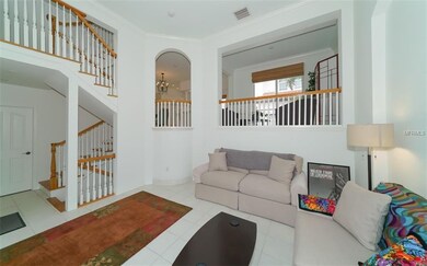 Living room showing the dining area and loft/sitti