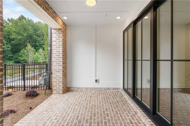 Slider doors from the patio open to the Media/Flex room offering the ultimate entertaining space.