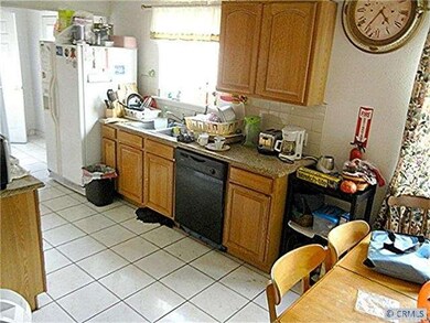 Granite kitchen with an area for a nice meal. Laun