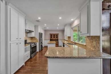 Updated cabinets and granite countertops.