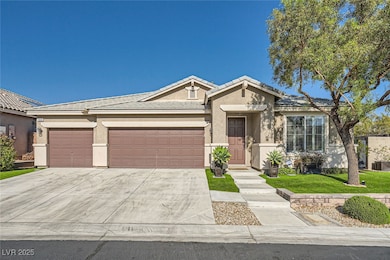 Single story home with stucco siding, concrete dri