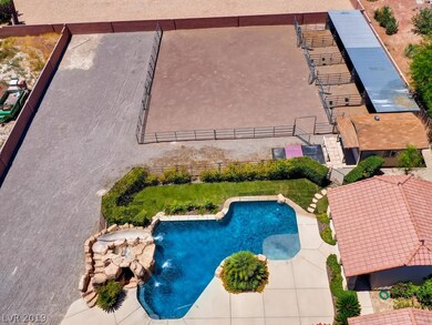 Pool has waterfall and slide. RV/Extra parking on