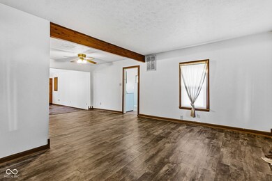 Front door takes you into the large living room.