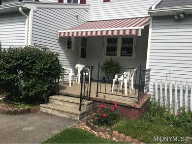 Patio off kitchen w/ awning