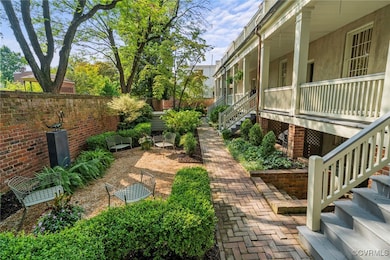 Back porch overlooking lovely gardens