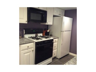 Kitchen. New tile flooring.