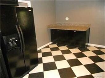 Breakfast area and a double door frig with ice and