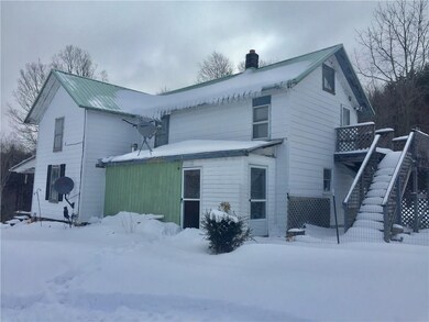 From Driveway - stairs are entrance to second floo