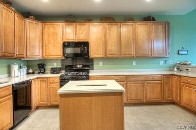 Tons of solid oak cabinets with pull out shelves.