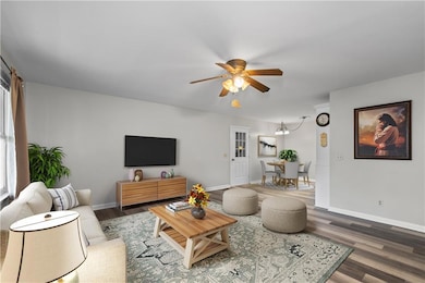 Living area featuring wood finished floors, ceilin