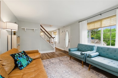 Living room with all new flooring throughout the h