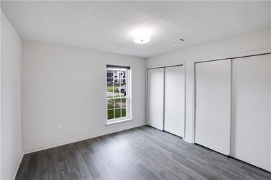 Bedroom with new windows and cellular shades