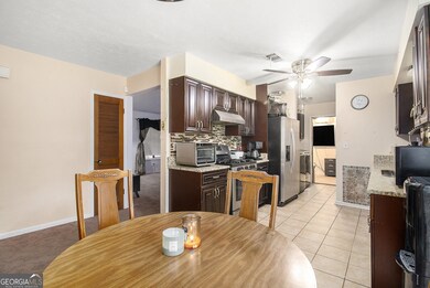Kitchen is equipped with Granite Countertops, Stai
