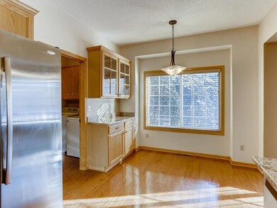 Eat-in kitchen with built-in china cabinetry