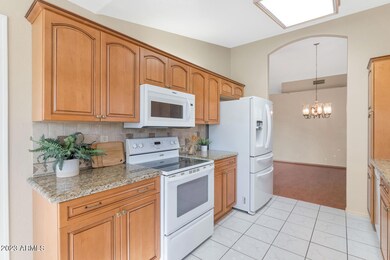 8431 W Utopia Rd-large-010-012-8431 W Ut