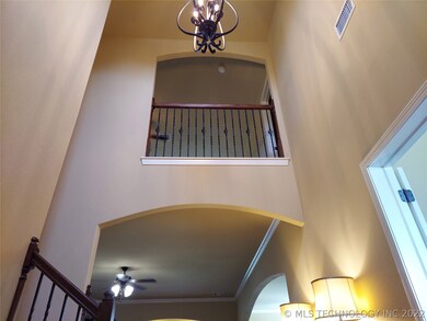 Stunning two story foyer with Juliet balcony with
