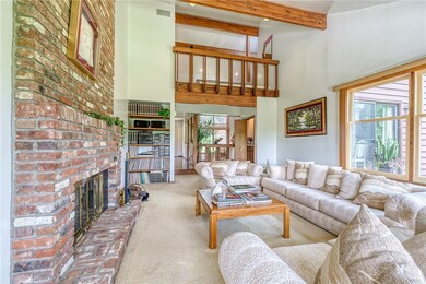 Enjoy sitting in front of the brick fireplace on c