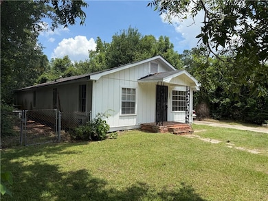 View of front facade featuring board and batten siding