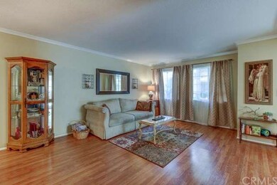 Open floor plan with crown molding and beautiful w