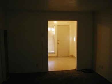 Front home, NE section of Living room to Kitchen. 