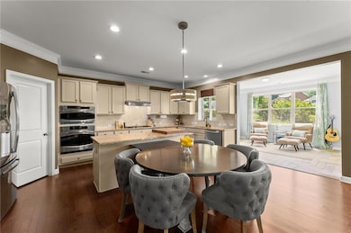 Kitchen with crown molding, stainless steel applia