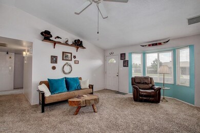 GRAND LIVING ROOM WITH BAY WINDOW
