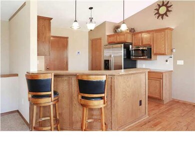 Kitchen view with breakfast bar area