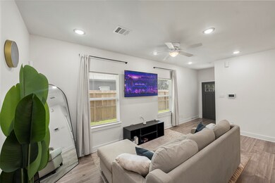 The living room is a bright, welcoming space that
