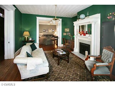 Living Room - Intricate scroll work on door and wi