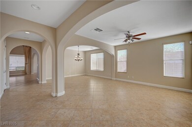 Empty room with visible vents, a healthy amount of