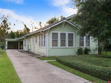 Exterior Front:  Wood frame home with raised and s